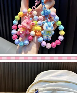 Handheld cute unicorn beaded keychains with colorful pearlescent beads and rainbow charms