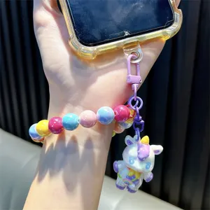 Colorful beaded phone wristlet strap with a cute unicorn charm for your smartphone.