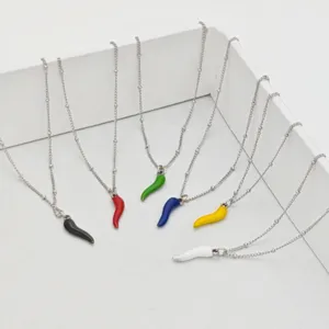Colorful chili pepper necklaces with stainless steel chains in various vibrant enamel colors.