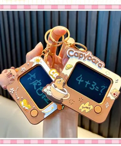 Close-up of cute Capybara electronic drawing board keychain toy with screen display