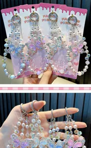 Detailed view of colorful crystal butterfly beaded phone straps and keychains
