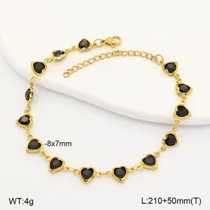 Detailed view of gold-tone heart anklet with black stones and technical dimensions