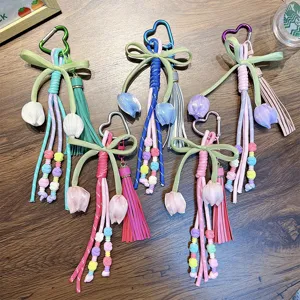 Handmade bohemian tulip flower woven keychain with tassels for bags and car decor