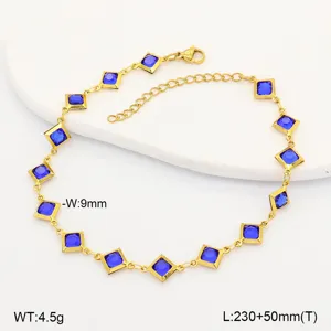 Detailansicht einer goldenen Edelstahl-Fußkette mit blauen Glassteinen und Maßen