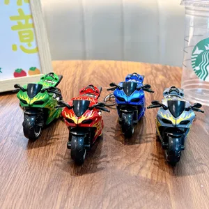 Detailed set of four colorful flame motorcycle toy model keychains on a wooden surface