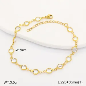 Detailed close-up of gold stainless steel anklet featuring clear round glass charms