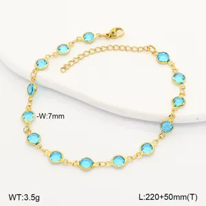 Close-up of gold stainless steel anklet with circular blue glass stones and sizing info