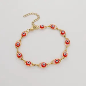Bracciale in acciaio inossidabile dorato con perline malocchio rosse in montature marquise