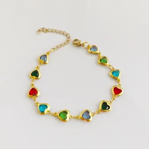 Detailed view of a colorful heart-shaped gem bracelet in gold-plated stainless steel