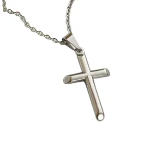 Minimalist stainless steel cross pendant necklace for everyday wear and versatile styling.
