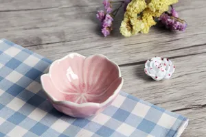 Close-up of pink lotus-shaped ceramic incense burner with a fine crackle glaze finish