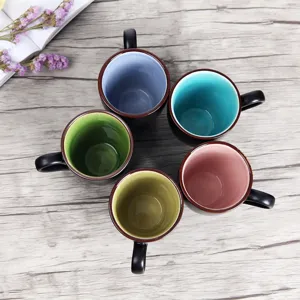 Japanese style matte black ceramic mugs set of five with vibrant colorful glazed interior