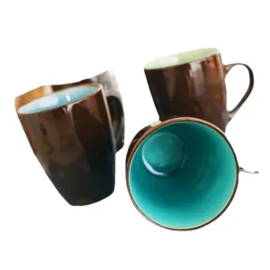 Japanese style matte brown ceramic mugs with colorful glazed interiors, set of three
