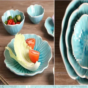 Detail of light blue ceramic petal dinnerware set with ice crackle glaze and lifestyle scene