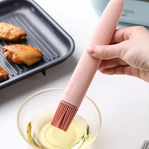 Durable pink heat-resistant silicone basting brush for oiling BBQ and air fryer baking