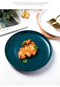 Detailed macro view of a matte teal ceramic dinner plate with cooked food in a lifestyle setting