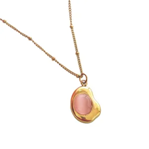 Gold-plated stainless steel necklace with irregular pink stone pendant