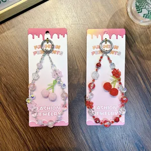 Handmade cherry beaded phone straps with colorful crystal charms in pink and red