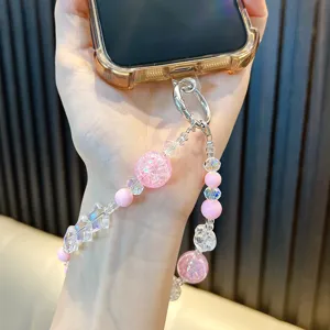 Kralen telefoonkoord met roze sterren en transparante acryl glitter kralen om de pols
