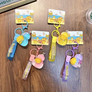 Lindos llaveros de botella de líquido patito Genki con arena brillante para bolsos