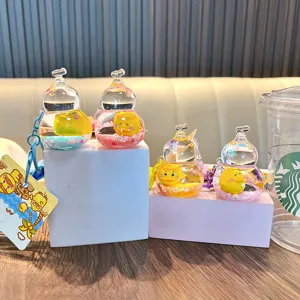 Lindo llavero de pato amarillo líquido en botella de calabaza para accesorios de bolso moda