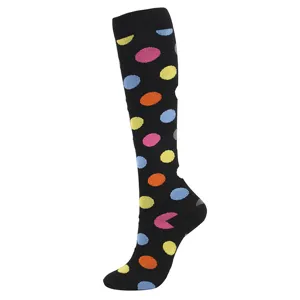 Chaussette de compression noire montante avec motif à pois colorés
