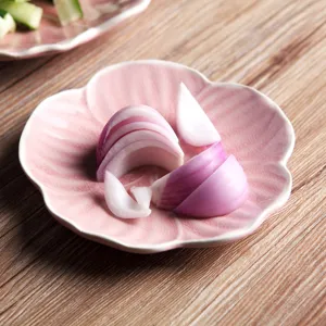 Artistic Japanese style pink ceramic petal plate for snacks, desserts and fruit service
