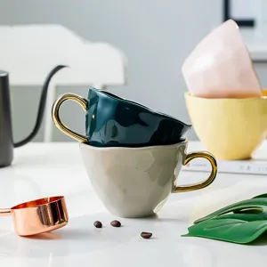 Elegant Nordic style irregular ceramic coffee mug set with luxury gold handle details