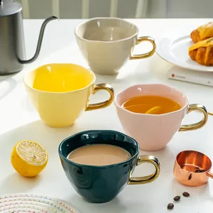 Nordic ceramic mugs with gold handles in various colors for coffee and milk