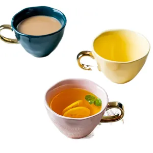 Nordic style ceramic coffee mugs with gold handles in teal, yellow, and pink set