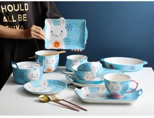 Set di stoviglie in ceramica con simpatico coniglio cartone animato blu e bianco
