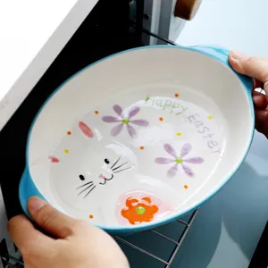 Grande teglia ovale in ceramica con simpatico viso di coniglio e motivi Happy Easter