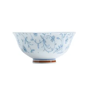 Bol à riz élégant en céramique de style japonais avec motif floral bleu délicat