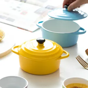 Minimalist yellow ceramic ramekin with lid and double handles for souffle baking