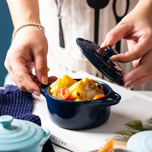 Navy blue ceramic baking bowl with lid and double handles for home use and desserts
