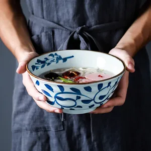 Hand-held Japanese underglaze blue floral ceramic noodle bowl for household soup and salad