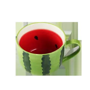 Creative watermelon ceramic mug featuring green rind stripes and red seed interior design