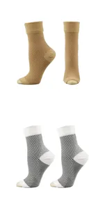 Detailed view of beige and striped 240N sports compression ankle sleeves on foot forms.