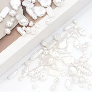 Detailed view of white ABS irregular baroque pearls for DIY jewelry craft making