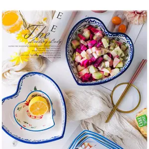 Set of heart-shaped ceramic dessert bowls with Japanese patterns in a lifestyle setting