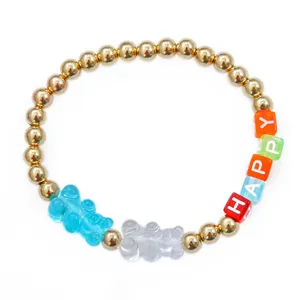 Vista detallada de pulsera de cuentas de colores con ositos de goma y letras HAPPY