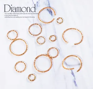 Detailed view of textured gold twisted open and closed rings for DIY jewelry making