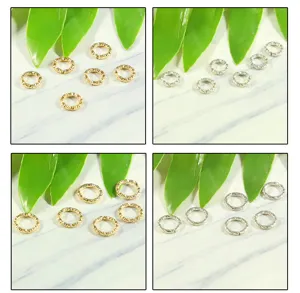Macro shot of gold and silver iron twisted open jump rings for DIY jewelry craft