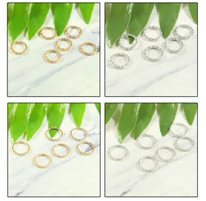 Detailed macro view of iron twisted jump rings in gold and silver for DIY jewelry making