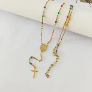 Detailed view of a gold stainless steel rosary necklace with colorful beads and a cross.