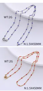Macro view of bohemian stainless steel necklaces with colorful enamel beads in blue and red