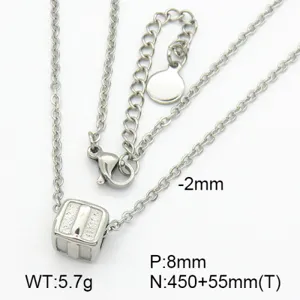 Close-up of titanium steel necklace showing letter I cube pendant and specs