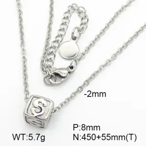 Detail view of titanium steel necklace with letter S cube pendant and specs.