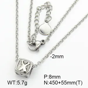Close-up of stainless steel necklace with cube pendant featuring engraved letter X