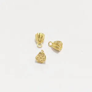 Detail view of three golden stainless steel lotus pod charms for DIY jewelry making